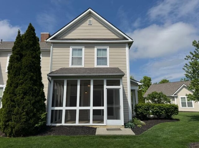 4020 Legend Unit 11, Columbus, OH 43230 - rear view of property featuring a sunroom and a yard