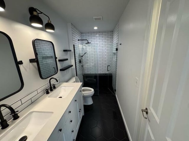 4020 Legend Unit 11, Columbus, OH 43230 - bathroom featuring toilet, a stall shower, tile patterned flooring, double vanity, and recessed lighting