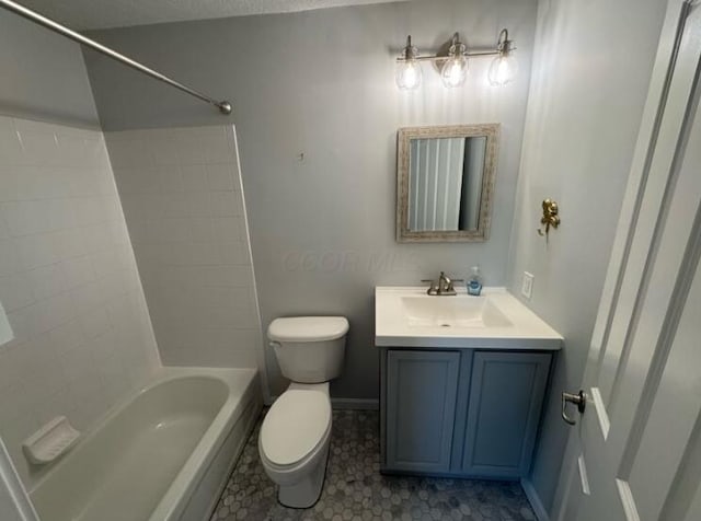 4020 Legend Unit 11, Columbus, OH 43230 - bathroom featuring toilet, vanity, bathing tub / shower combination, and tile patterned floors