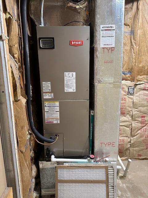 50 Stagecoach Rd, Chillicothe, OH 45601 - utility room featuring heating unit