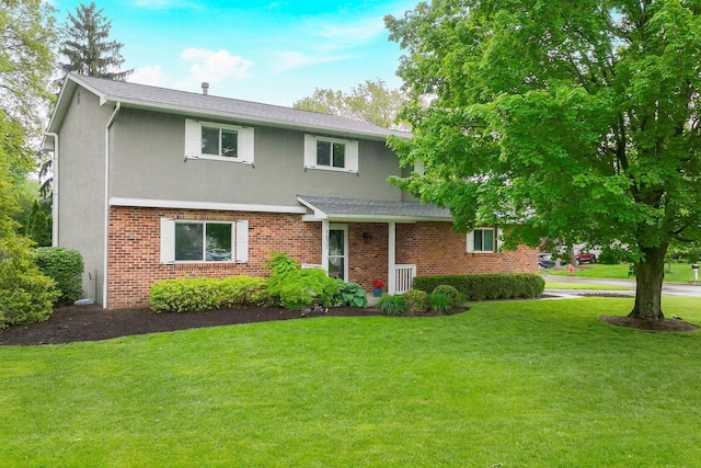 1671 Dollivor Dr, Columbus, OH 43235 - traditional-style house with a front yard and stucco siding