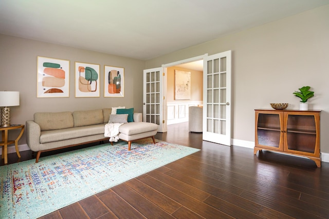 1671 Dollivor Dr, Columbus, OH 43235 - living area with french doors, wood finished floors, and baseboards