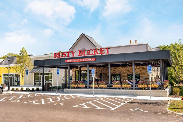 1671 Dollivor Dr, Columbus, OH 43235 - view of commercial property with uncovered parking