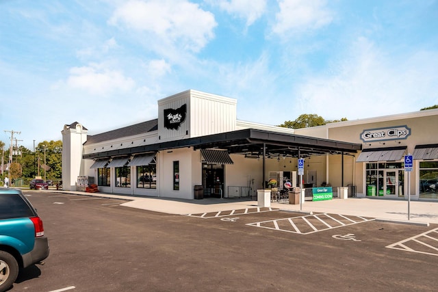 1671 Dollivor Dr, Columbus, OH 43235 - view of commercial property featuring uncovered parking