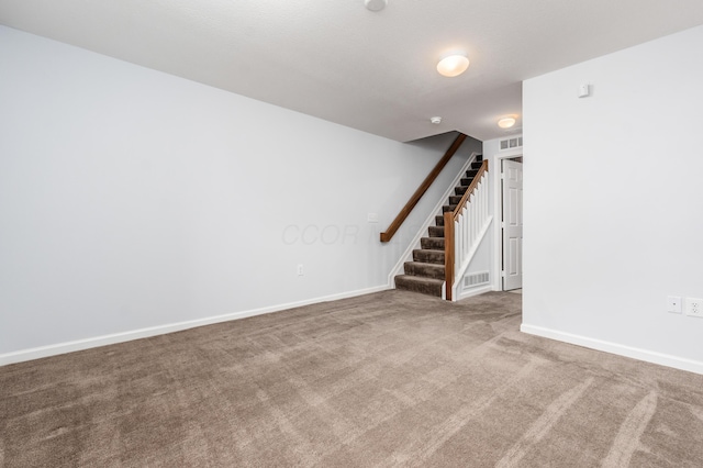 5962 Thunder Gulch Dr, New Albany, OH 43054 - spare room featuring stairway, carpet floors, and baseboards