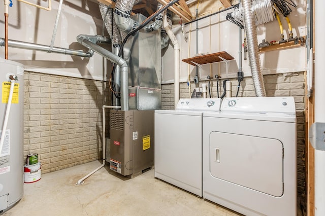 5962 Thunder Gulch Dr, New Albany, OH 43054 - laundry area featuring washing machine and clothes dryer, water heater, and heating unit