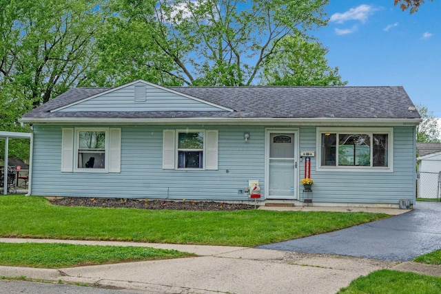 3233 Burdett Ct, Columbus, OH 43232 - view of front of home featuring a front lawn and roof with shingles