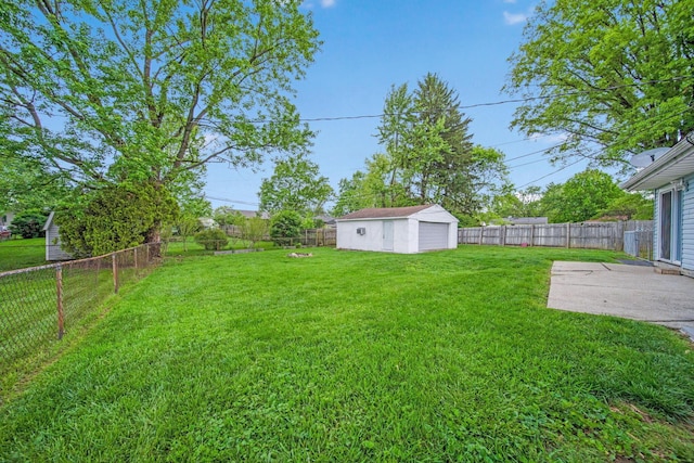 3233 Burdett Ct, Columbus, OH 43232 - view of yard featuring a patio area and an outbuilding