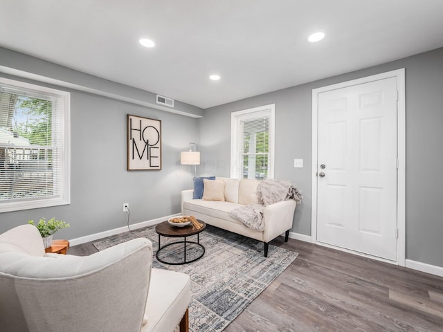 2767 Hiawatha St, Columbus, OH 43211 - living room featuring baseboards, wood finished floors, and recessed lighting