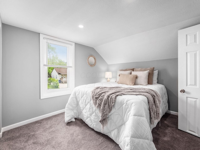 2767 Hiawatha St, Columbus, OH 43211 - bedroom featuring carpet, lofted ceiling, and baseboards
