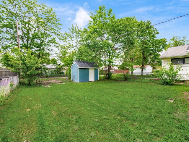 2767 Hiawatha St, Columbus, OH 43211 - view of yard with a shed and an outbuilding