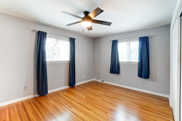 789 Chelsea Ave, Columbus, OH 43209 - empty room with ceiling fan, light wood finished floors, and baseboards