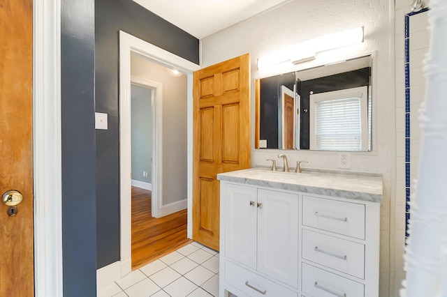 789 Chelsea Ave, Columbus, OH 43209 - bathroom featuring tile patterned flooring, vanity, and baseboards