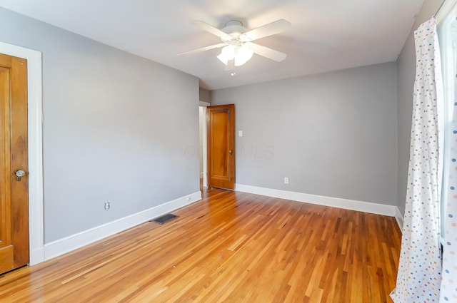 789 Chelsea Ave, Columbus, OH 43209 - unfurnished bedroom featuring light wood-type flooring, baseboards, and a ceiling fan