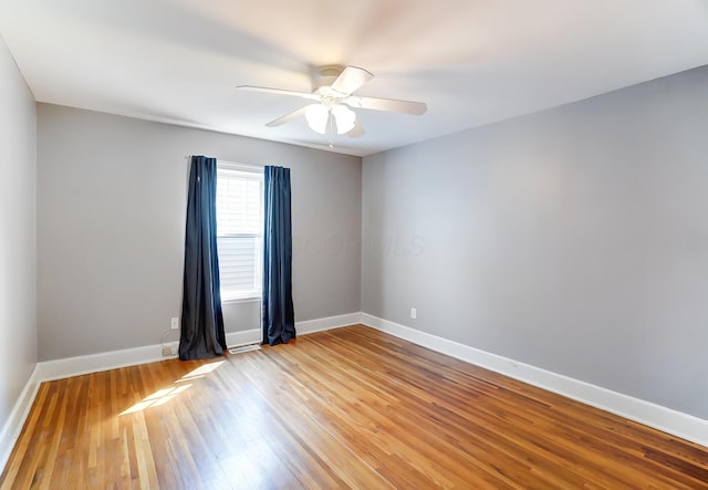 789 Chelsea Ave, Columbus, OH 43209 - unfurnished room featuring light wood-style floors, baseboards, and ceiling fan