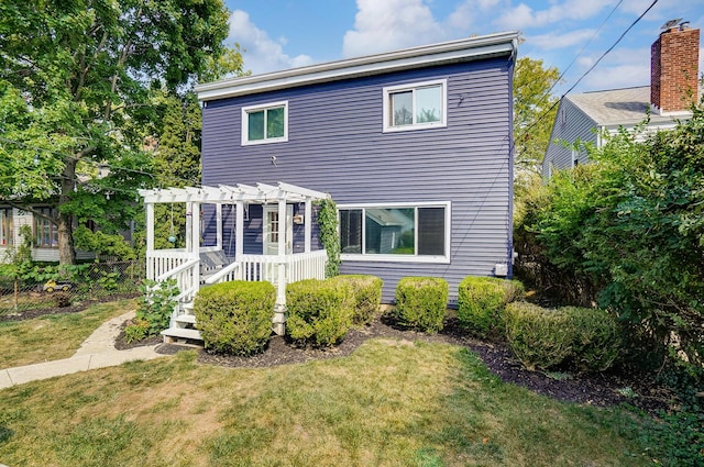 789 Chelsea Ave, Columbus, OH 43209 - view of front of property with a pergola and a front lawn