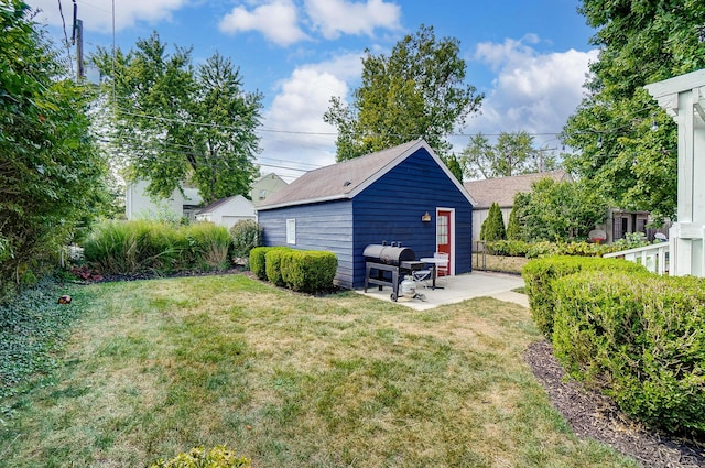 789 Chelsea Ave, Columbus, OH 43209 - rear view of house featuring a patio, a lawn, and an outdoor structure