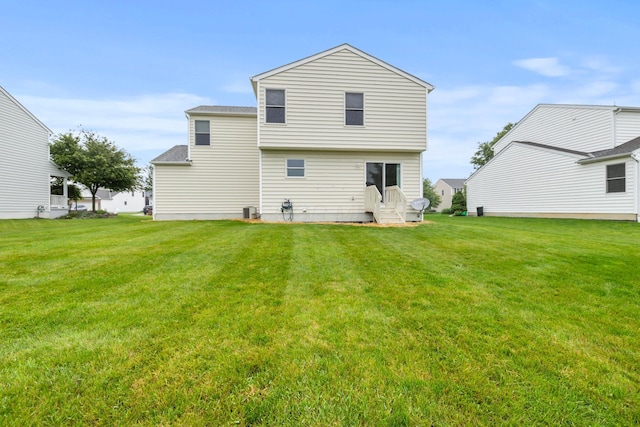 1608 Geranium Dr, Lewis Center, OH 43035 - back of house featuring entry steps and a yard