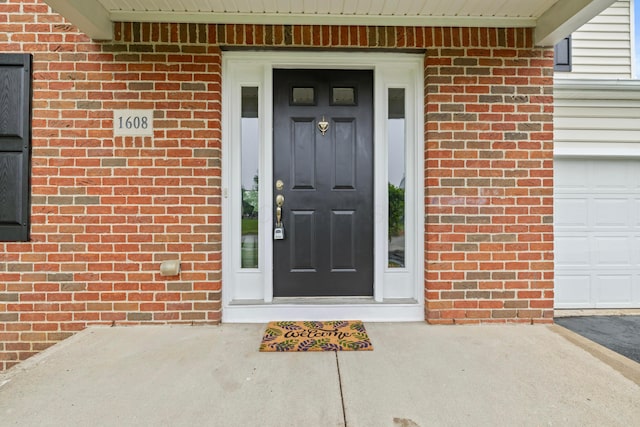 1608 Geranium Dr, Lewis Center, OH 43035 - property entrance with brick siding
