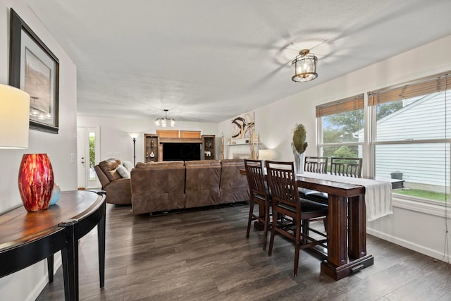 1608 Geranium Dr, Lewis Center, OH 43035 - dining room with dark wood-style floors and a chandelier