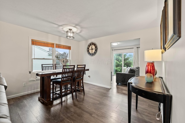 1608 Geranium Dr, Lewis Center, OH 43035 - dining room with dark wood-style floors and baseboards