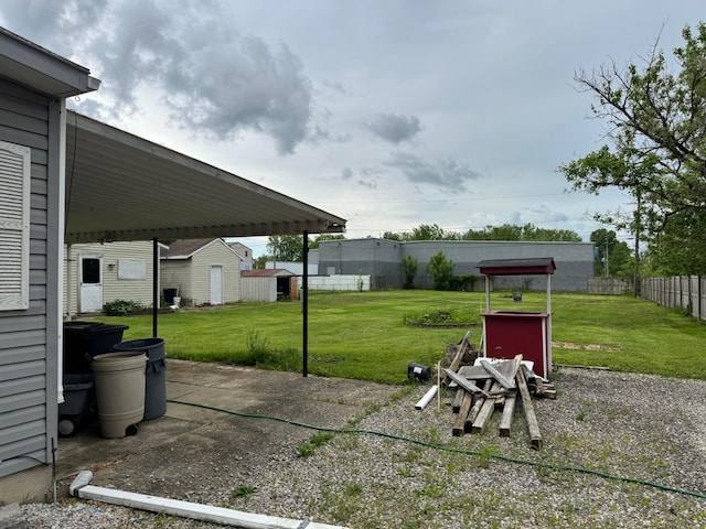 view of yard with a storage unit and an outdoor structure