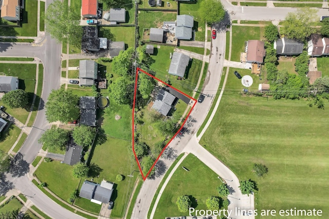 aerial perspective of suburban area featuring property boundaries highlighted