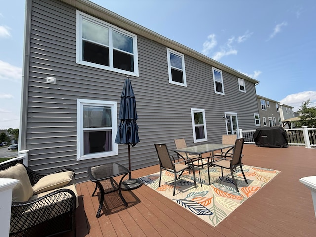 210 Glemsbury Dr, Delaware, OH 43015 - wooden deck featuring a grill and outdoor dining area