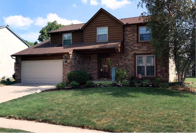 view of front facade with a front yard, an attached garage, driveway, and brick siding