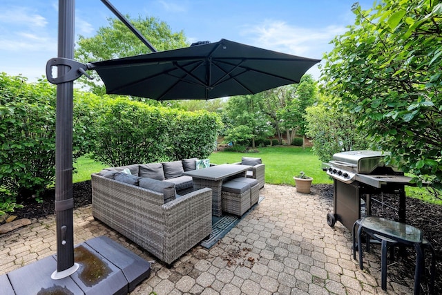 view of patio / terrace featuring an outdoor living space and grilling area