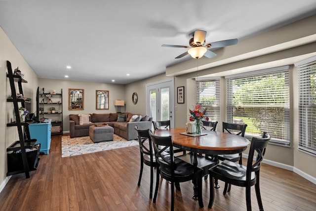 dining room with hardwood / wood-style floors, ceiling fan, recessed lighting, and baseboards