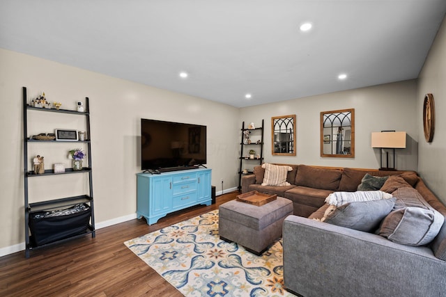 living room with dark wood finished floors, baseboards, and recessed lighting