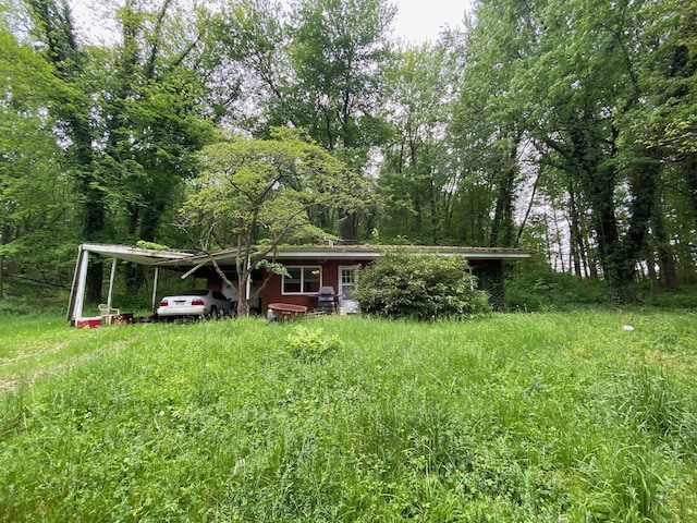 2615 Hamburg Rd SW, Lancaster, OH 43130 - rear view of property with a carport