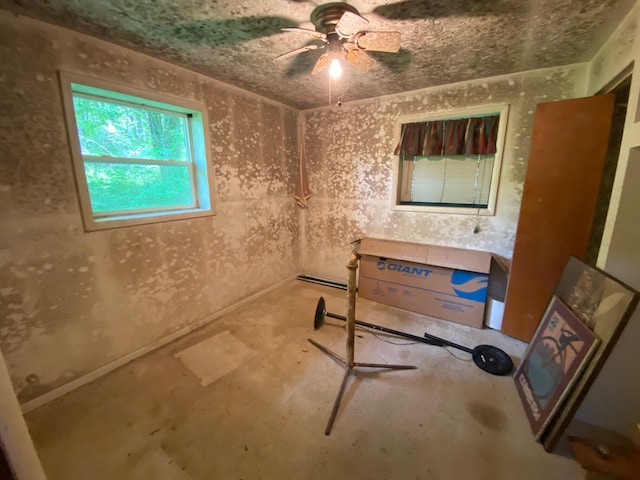 2615 Hamburg Rd SW, Lancaster, OH 43130 - empty room with concrete flooring and a ceiling fan