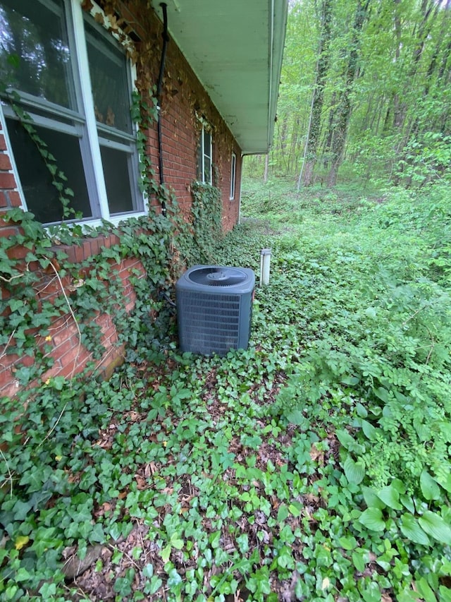 2615 Hamburg Rd SW, Lancaster, OH 43130 - exterior view of central AC unit and brick siding