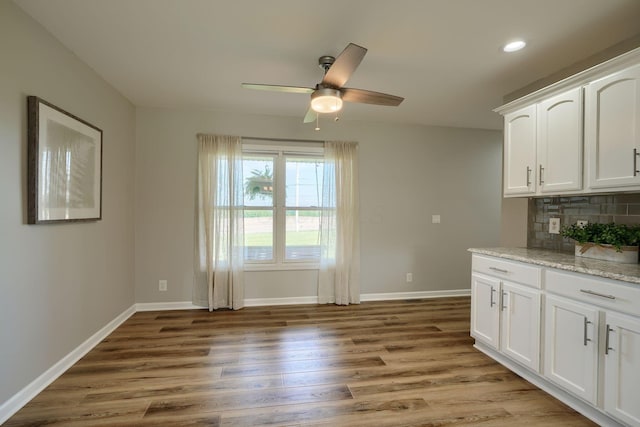 1899 Lamb Rd NW, Carroll, OH 43112 - unfurnished dining area featuring light wood-style floors, a ceiling fan, baseboards, and recessed lighting