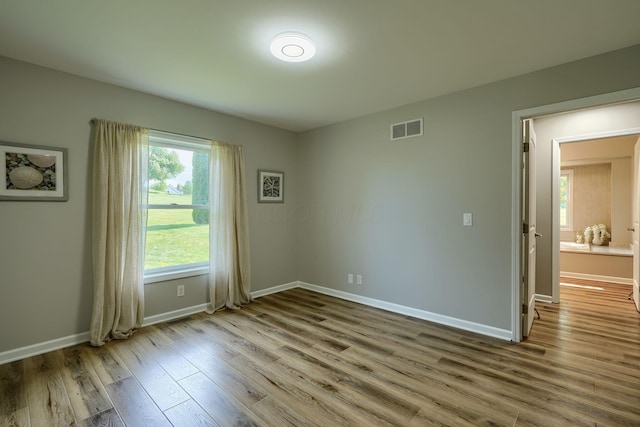 1899 Lamb Rd NW, Carroll, OH 43112 - spare room with wood finished floors and baseboards