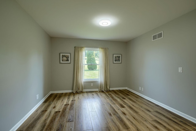 1899 Lamb Rd NW, Carroll, OH 43112 - unfurnished room featuring dark wood-type flooring and baseboards