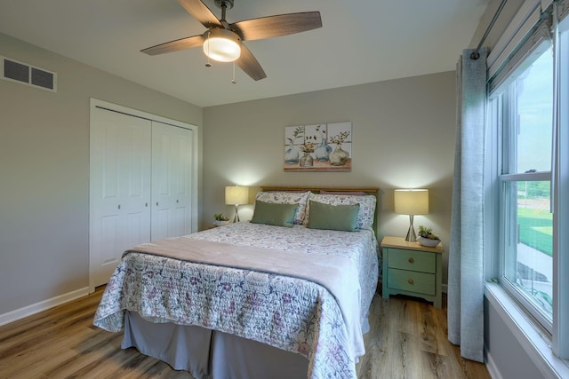 1899 Lamb Rd NW, Carroll, OH 43112 - bedroom featuring wood finished floors, a closet, ceiling fan, and baseboards