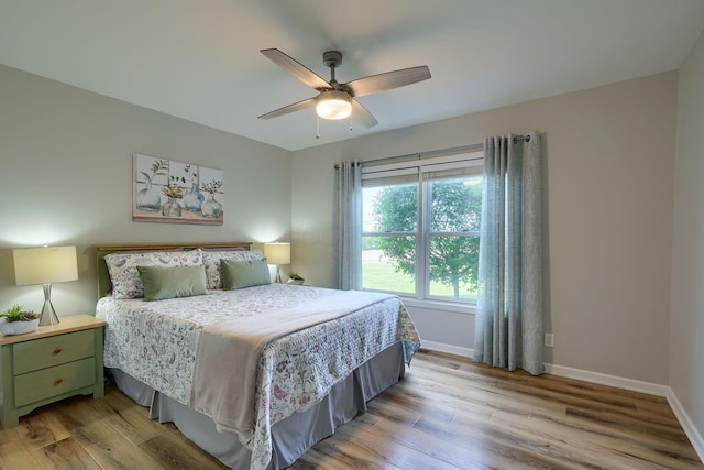 1899 Lamb Rd NW, Carroll, OH 43112 - bedroom with light wood-style floors, baseboards, and a ceiling fan