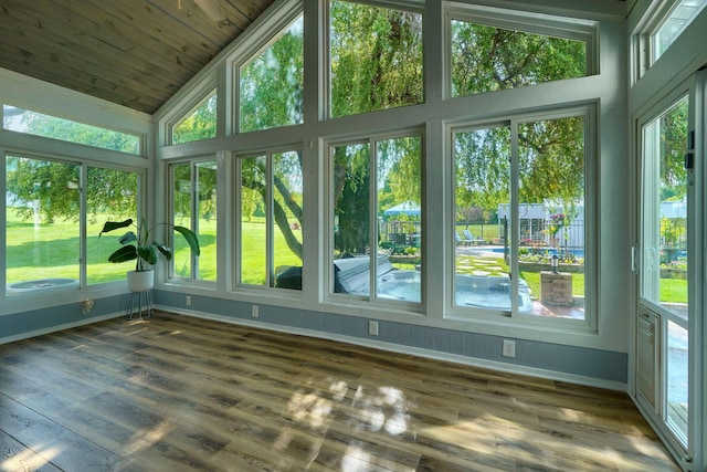 1899 Lamb Rd NW, Carroll, OH 43112 - unfurnished sunroom with baseboards, plenty of natural light, wood finished floors, high vaulted ceiling, and wood ceiling