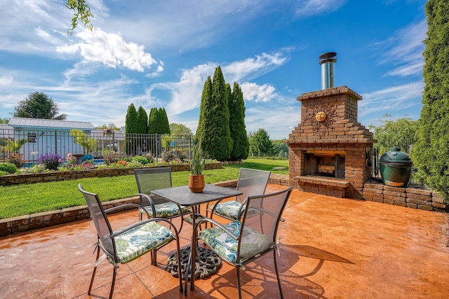 1899 Lamb Rd NW, Carroll, OH 43112 - view of patio with an outdoor brick fireplace and outdoor dining area