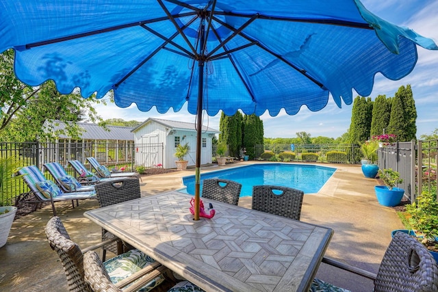 1899 Lamb Rd NW, Carroll, OH 43112 - view of swimming pool featuring a fenced backyard, a patio, and outdoor dining space