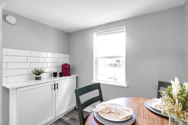 527 E Welch Ave, Columbus, OH 43207 - dining room featuring dark wood-style flooring