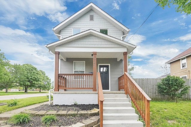 527 E Welch Ave, Columbus, OH 43207 - view of front of home with a porch and fence