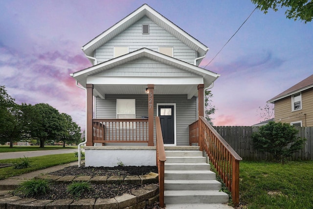 527 E Welch Ave, Columbus, OH 43207 - view of front of property with a porch and fence