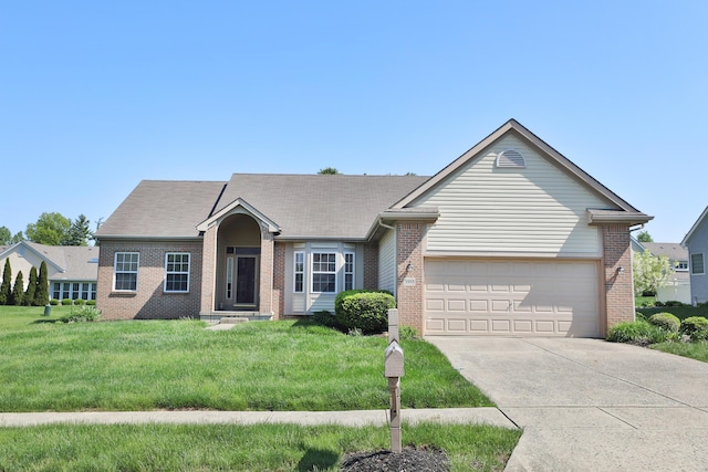 5988 Carnegie Cove Ct, Columbus, OH 43213 - single story home featuring brick siding, concrete driveway, a front lawn, and a garage