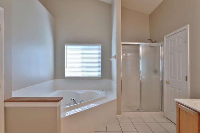 5988 Carnegie Cove Ct, Columbus, OH 43213 - bathroom with a shower stall, tile patterned flooring, a garden tub, and vanity
