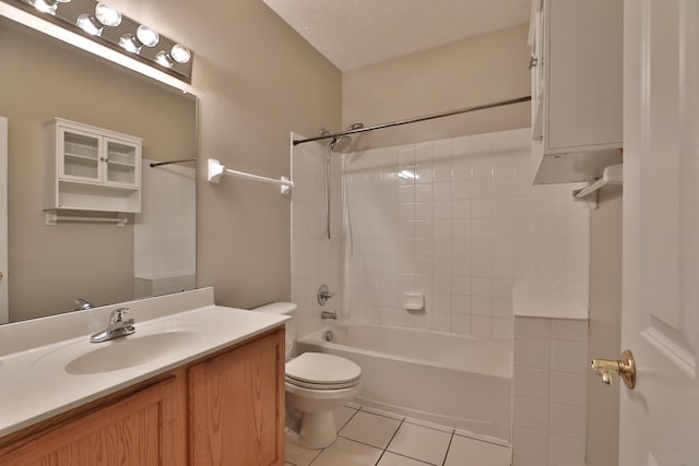 5988 Carnegie Cove Ct, Columbus, OH 43213 - bathroom featuring tile patterned floors, toilet, vanity, and bathing tub / shower combination