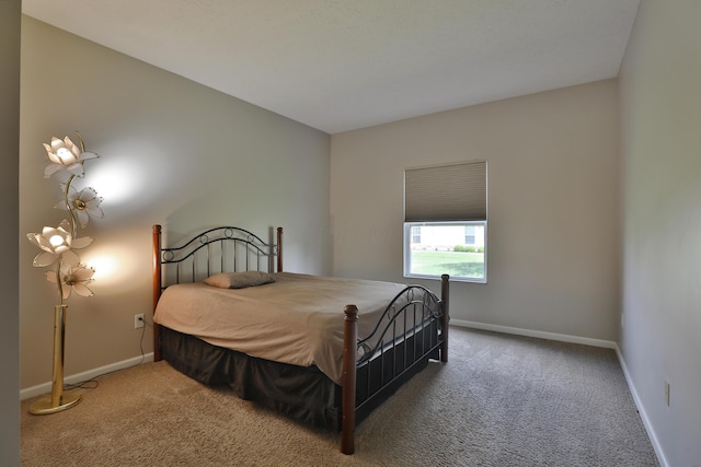 5988 Carnegie Cove Ct, Columbus, OH 43213 - carpeted bedroom featuring baseboards